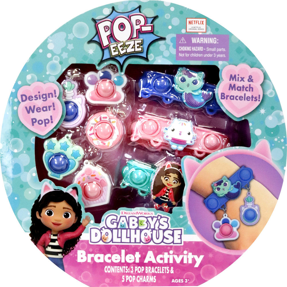 Pop-Eeze Gabby's Dollhouse Bracelet Activity Set packaging showing colorful pop fidget bracelets and charms with character designs on turquoise and pink circula
