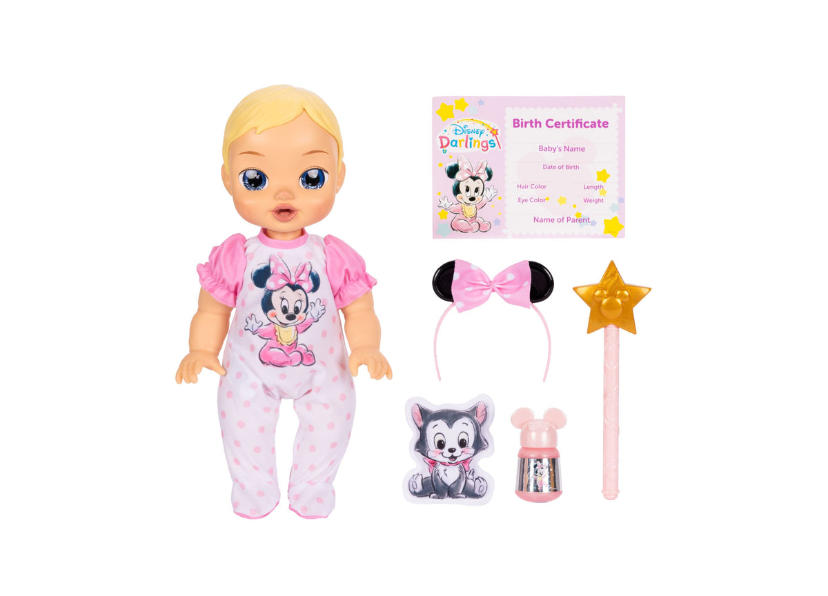 Disney Darlings 13-inch Minnie Mouse doll in pink outfit with accessories including headband, wand, and plush cat toy