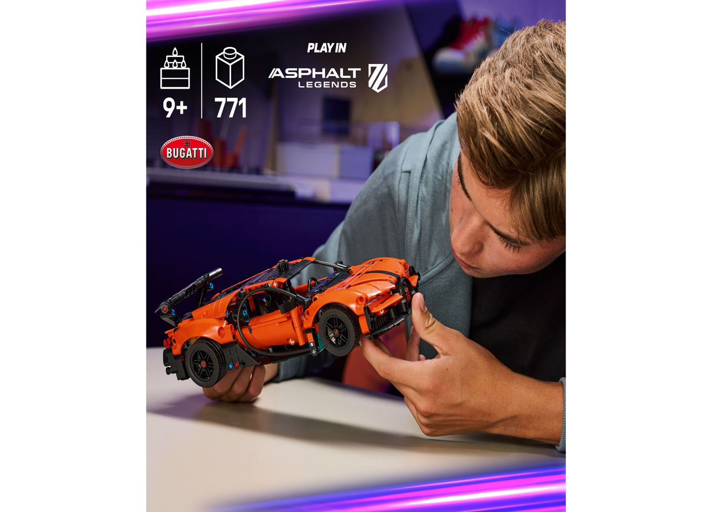 LEGO Technic Bugatti Chiron orange hypercar building toy with 771 pieces held in hands