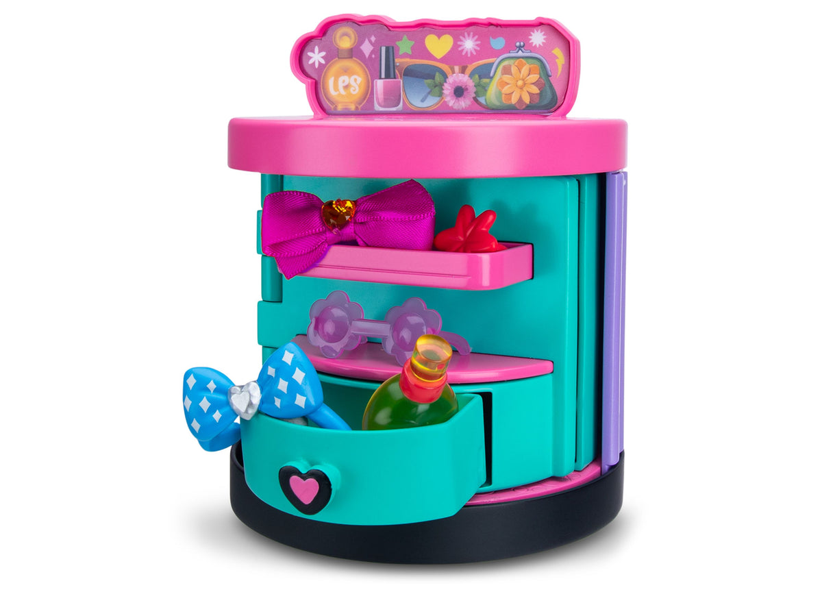 Littlest Pet Shop Spin and Style Boutique Playset with turquoise and pink rotating station, accessories, and bobbling...