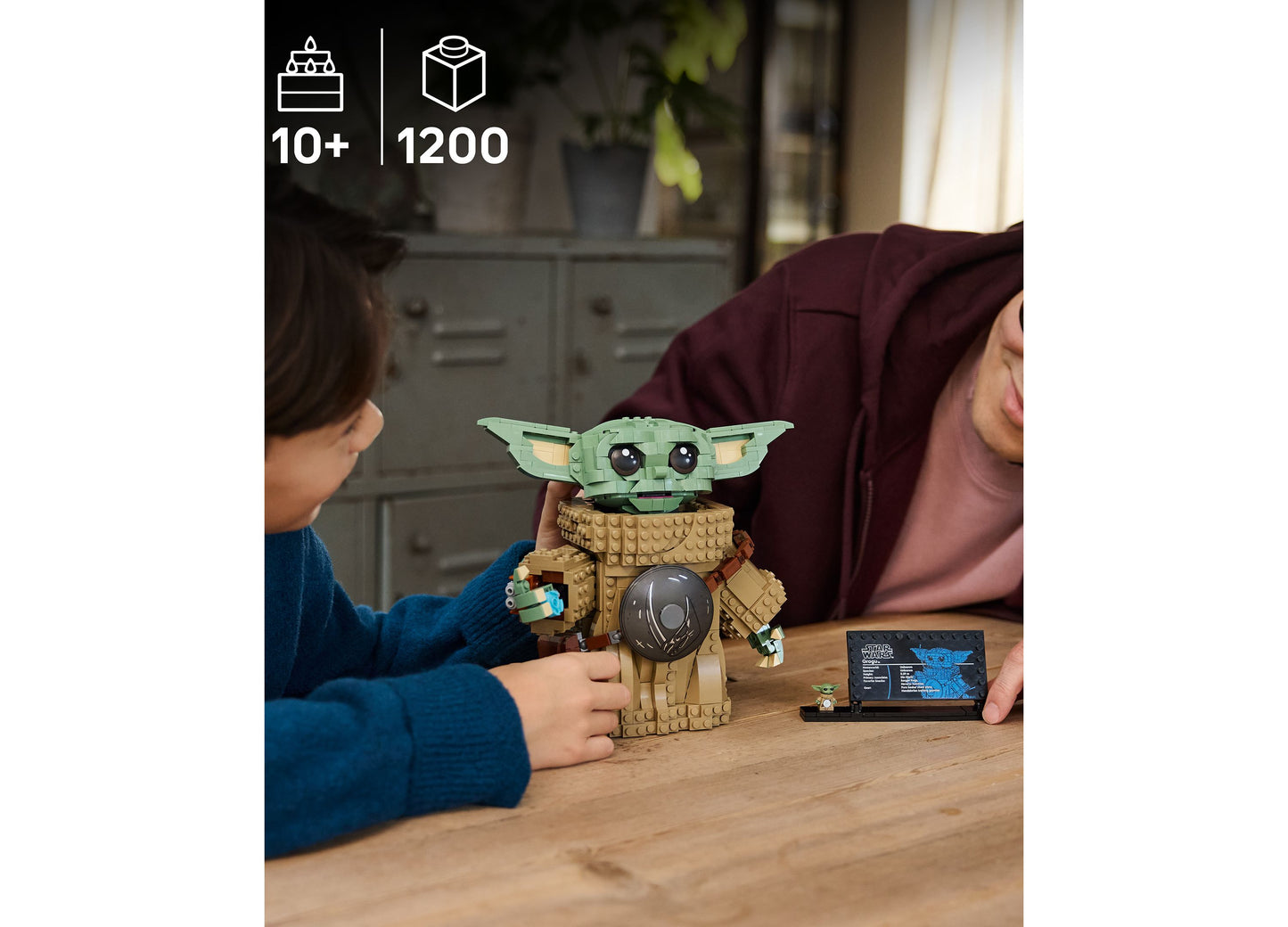 LEGO Star Wars Grogu Mandalorian Apprentice 75446 building set with 1200 pieces displayed with child