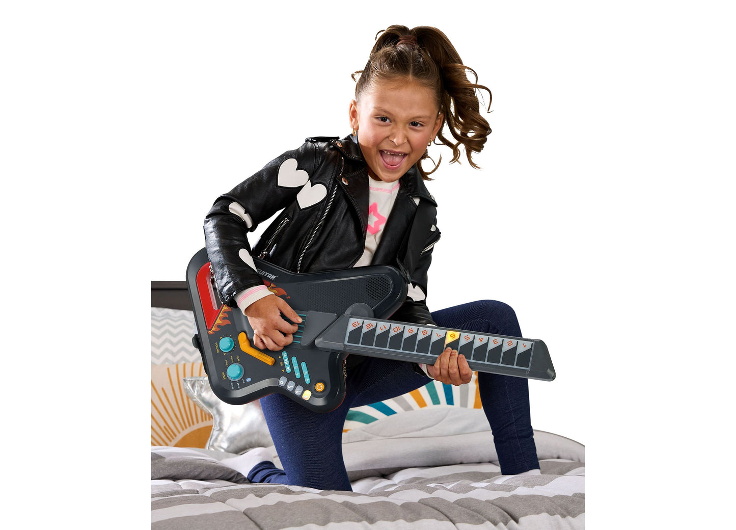 VTech Kidi Star Rock Star Guitar in black with colorful buttons, held by smiling child