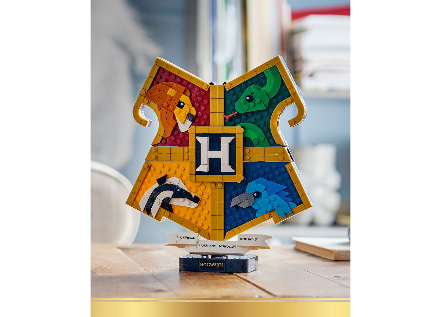 LEGO Harry Potter Hogwarts House Crest 76462 building set with four colorful house crests featuring lions, snakes, ba...