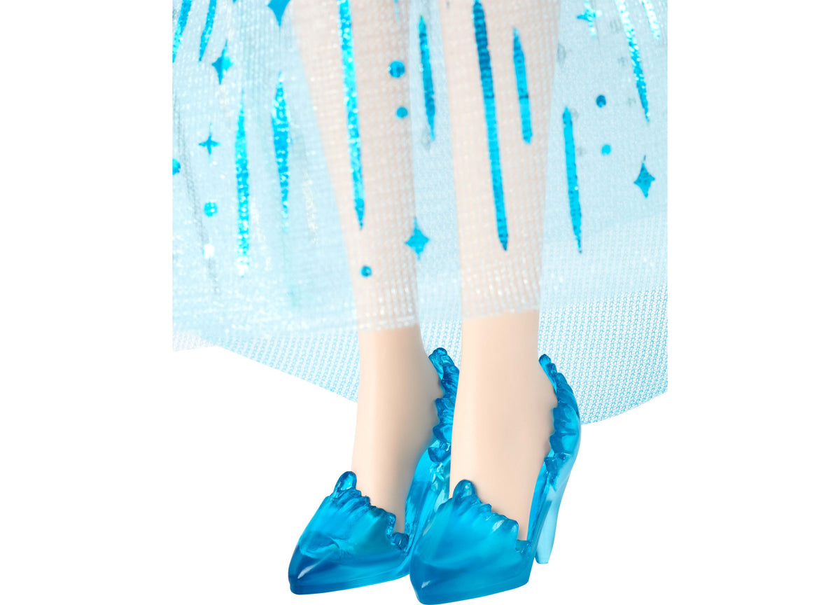 Disney Princess Elsa 11" doll wearing light blue sparkly dress with cape and blue shoes