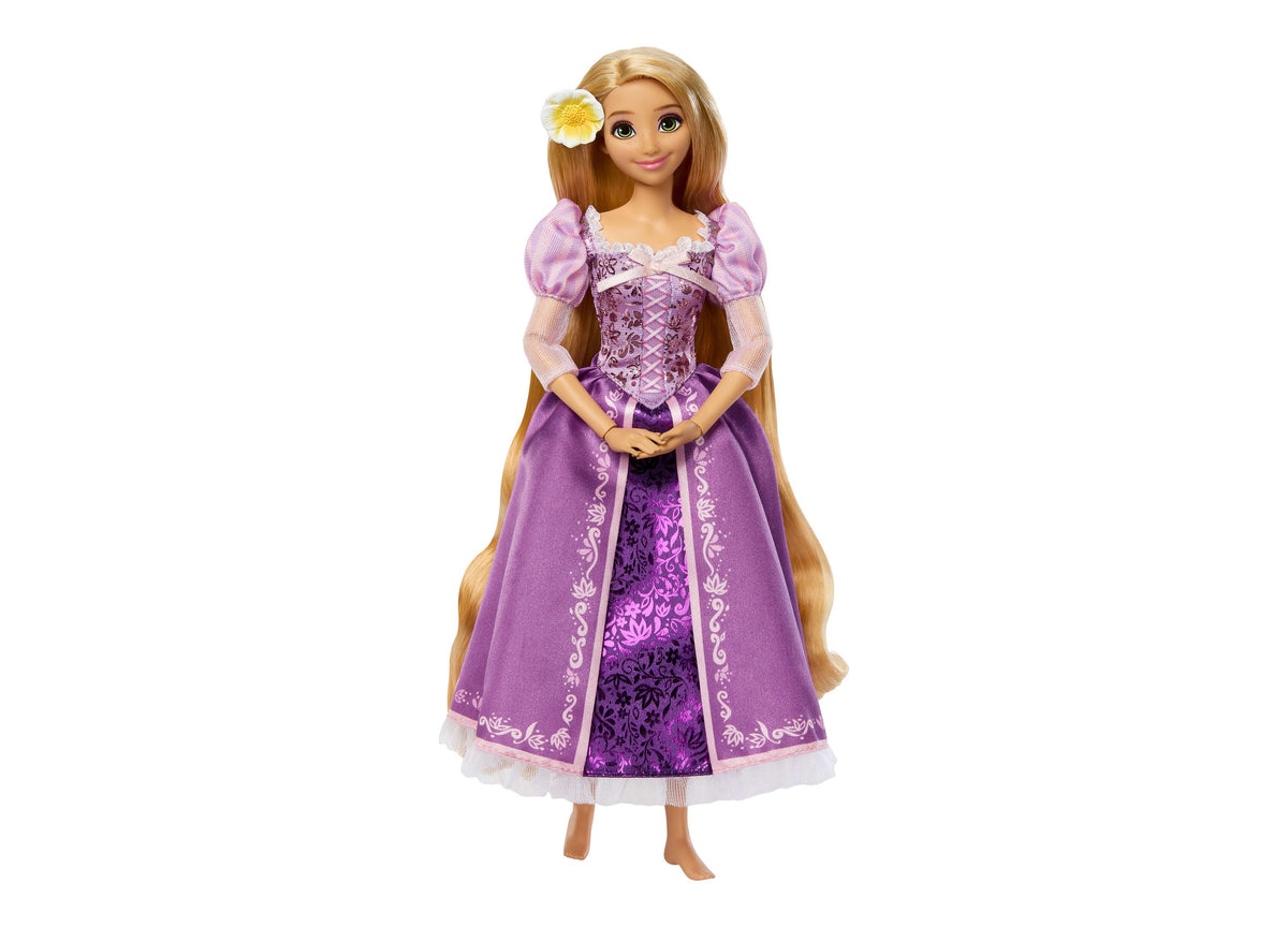 Disney Princess Rapunzel 13" doll wearing purple gown with long blonde hair and flower accessory