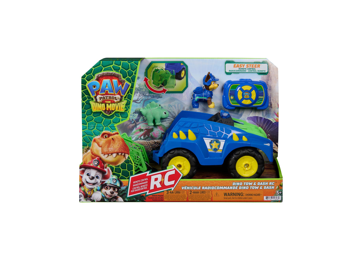 PAW Patrol Dino Tow Dash RC remote control vehicle in blue with yellow wheels, Chase figure, and green Stegosaurus di...