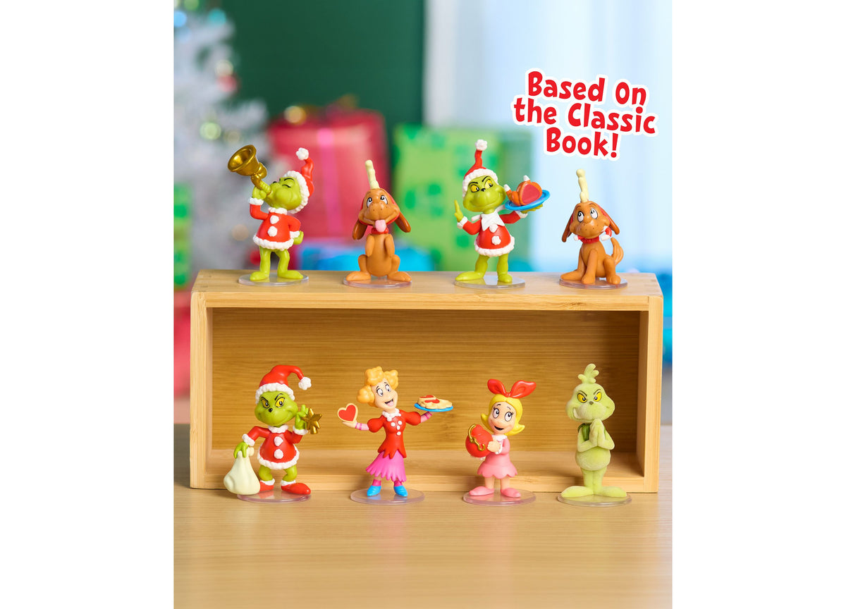Dr. Seuss Grinch 8-Piece Collectible Figure Set featuring green Grinch characters and Whoville residents in red and f...