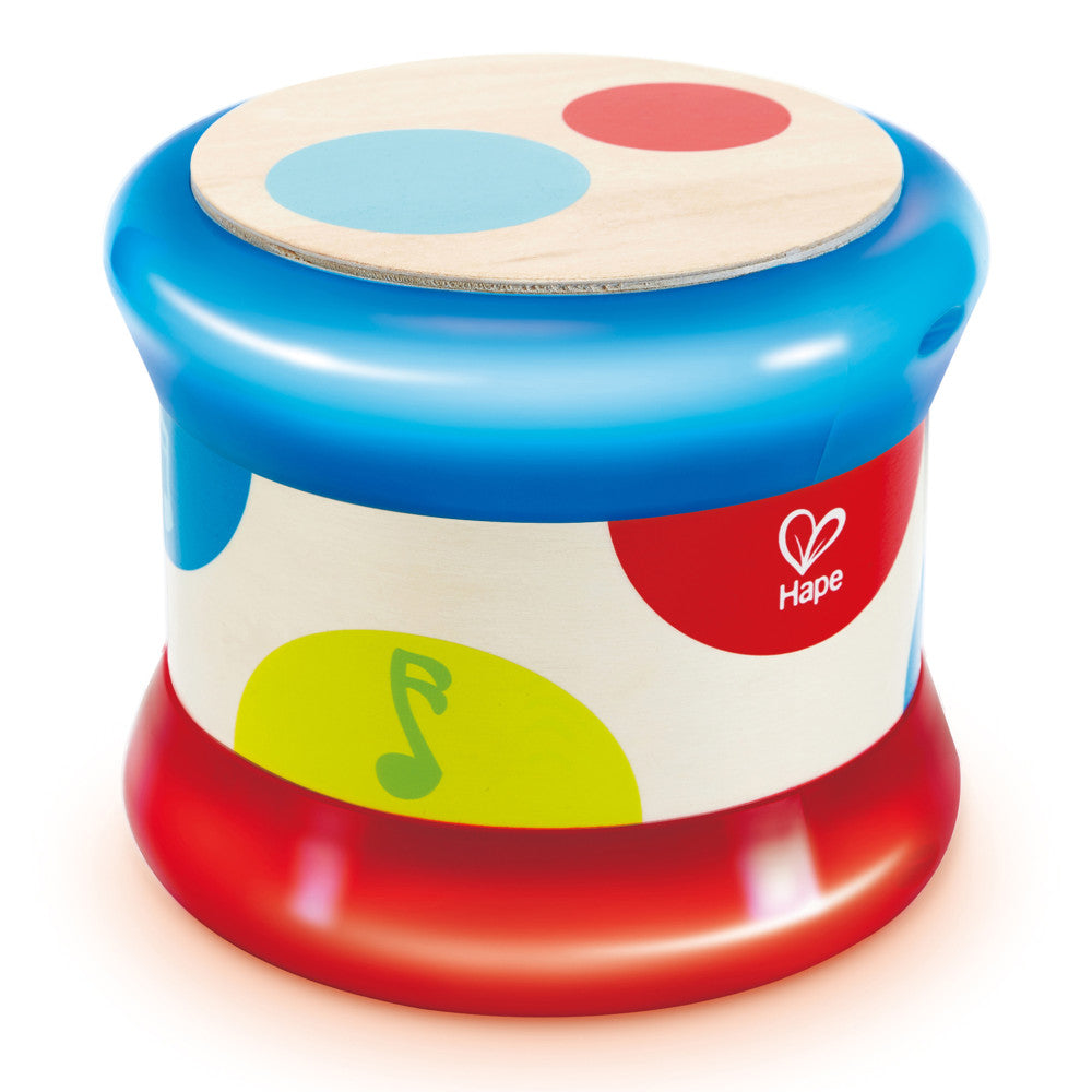 Colorful baby drum with blue top, red base, and natural wood drumhead featuring light blue and red circles on surface