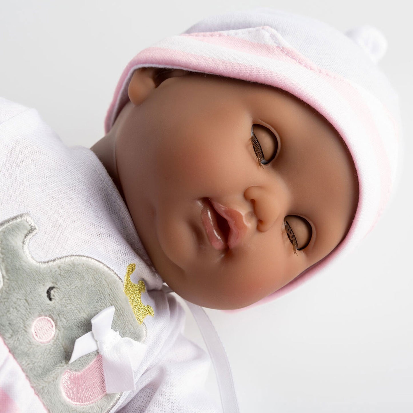 JC Toys Nonis Boutique 15" African American baby doll with pink outfit and open/close eyes