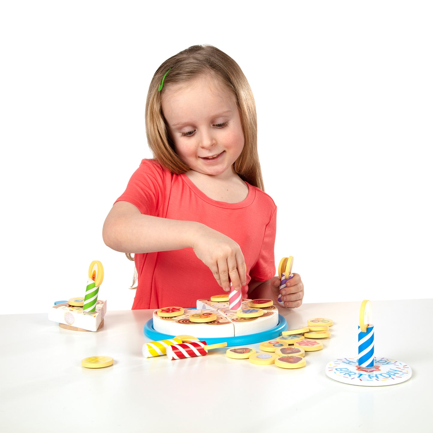 Melissa & Doug Birthday Cake Wooden Pretend Play Food Set with 34 pieces, girl playing with colorful cake and candles