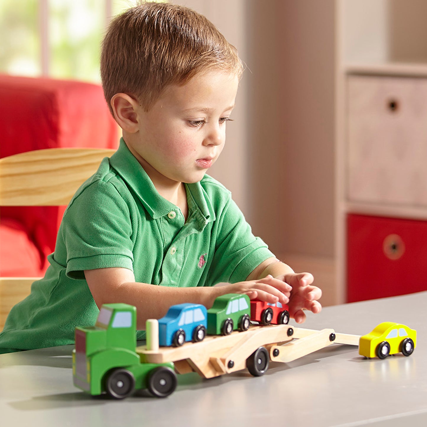 Melissa & Doug Wooden Car Carrier Truck with 4 colorful wooden cars in green, blue, red, and yellow