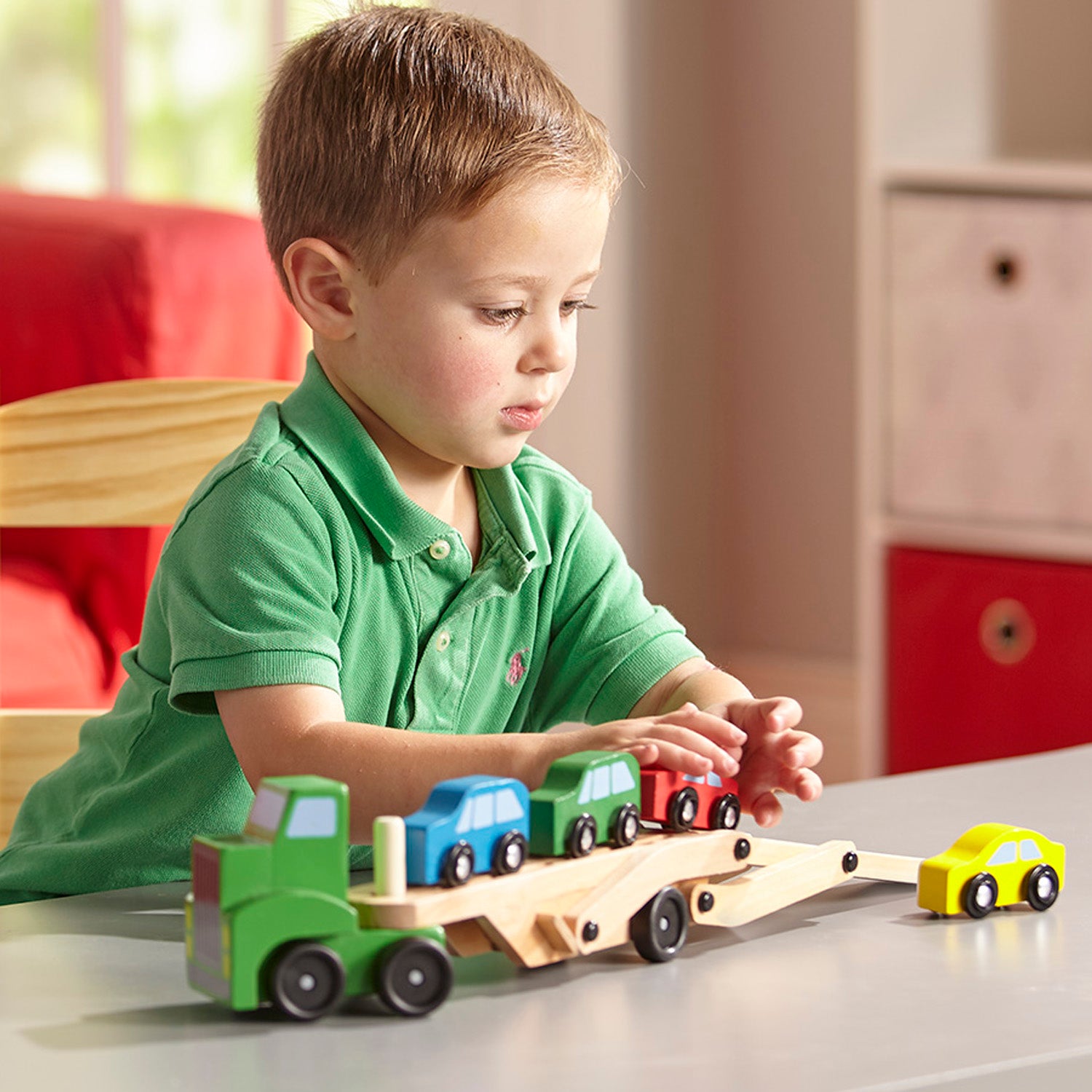 Melissa & Doug Wooden Car Carrier Truck with 4 colorful wooden cars in green, blue, red, and yellow