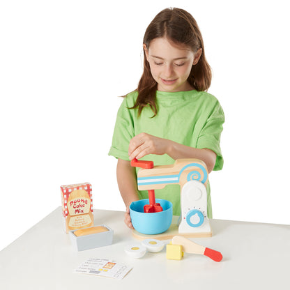 Melissa & Doug Wooden Make-a-Cake Mixer Set with blue bowl, red spatula, and accessories