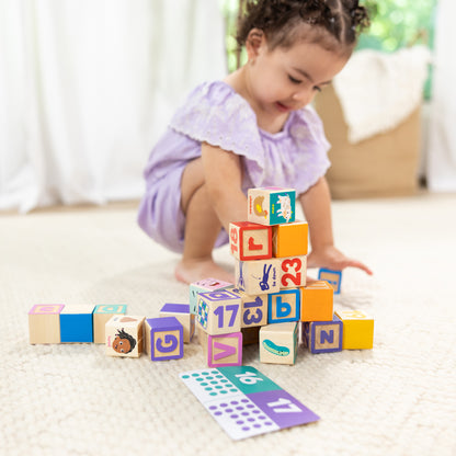 Melissa & Doug Ms. Rachel Wooden Learning Blocks with colorful numbered cubes and activity cards
