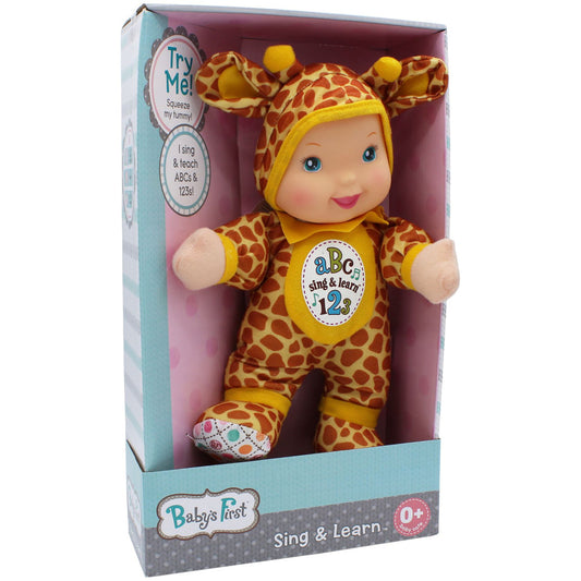 Baby's First Sing & Learn giraffe doll in yellow and red giraffe-print outfit with yellow accents, displayed in packaging