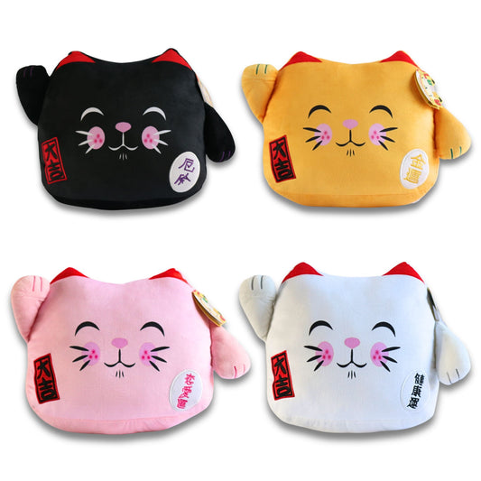 Four plush Maneki Neko lucky cat cushions in black, gold, pink, and white with closed eyes, red ears, whiskers, and red and white circular tags