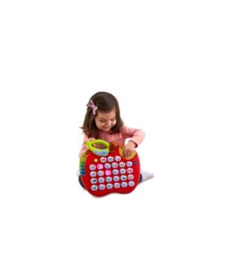 VTech ABC Learning Apple red interactive toy with 26 light-up letter buttons, shown with child playing