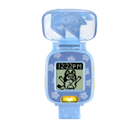Blue VTech Bluey Wackadoo Watch with translucent top, star-patterned band, LCD screen displaying pixelated character and time 12:22 PM, yellow action button