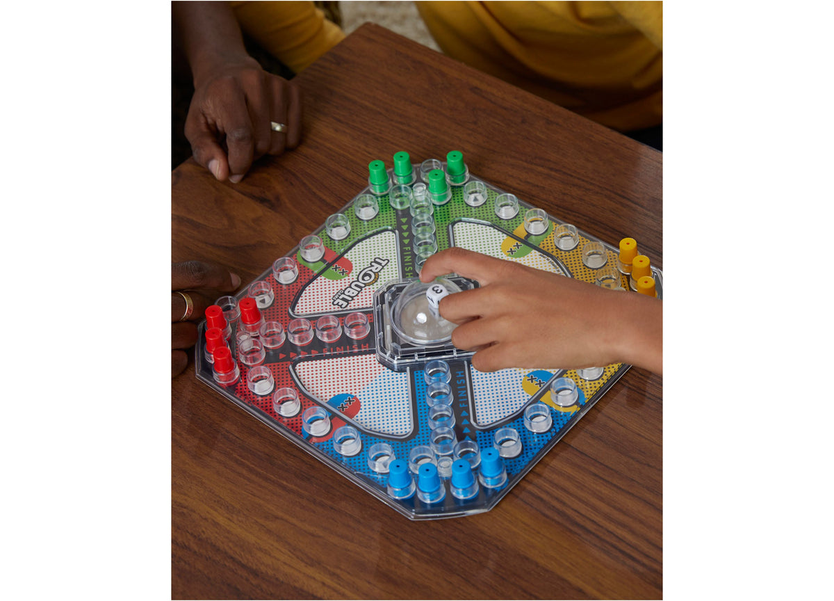 Hasbro Trouble Pop-O-Matic Board Game with colorful game board, Pop-O-Matic bubble roller, and colored game pieces