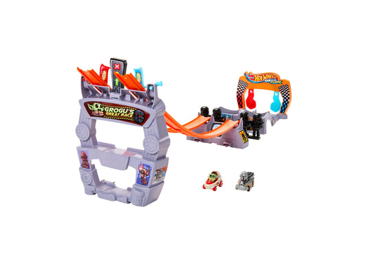 Hot Wheels Racerverse Star Wars track set with purple castle-shaped launcher, orange track sections, Grogu and Mandalorian character racers, and two small die-c