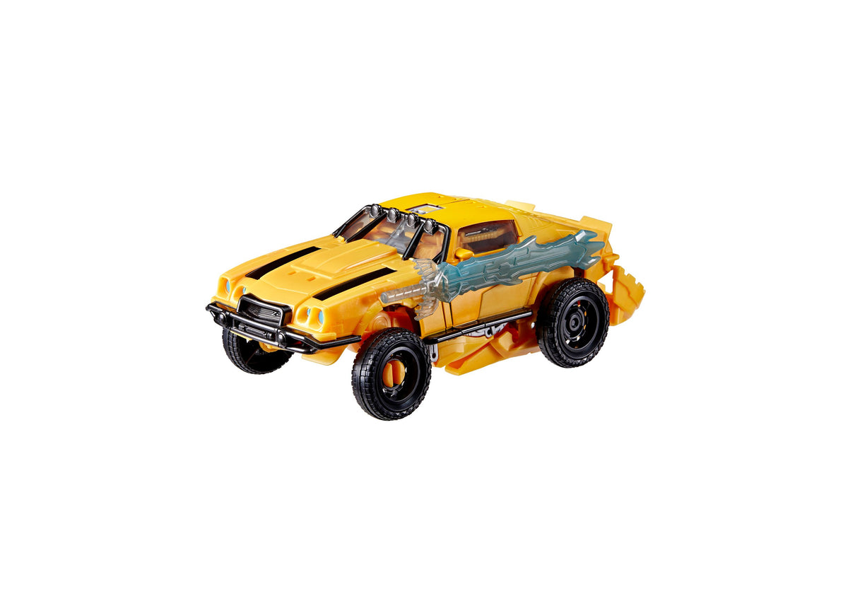 Transformers Rise of the Beasts Bumblebee 10-inch Triple Changer action figure in yellow Camaro vehicle mode with gra...