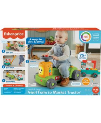 Fisher-Price Laugh & Learn Farm to Market Tractor and Wagon Interactive Ride-On Toy