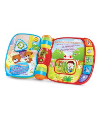 VTech Musical Rhymes Interactive Learning Book with colorful pages, piano keys, and light-up star
