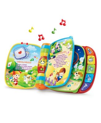 VTech Musical Rhymes Interactive Learning Book with colorful pages, piano keys, and light-up star