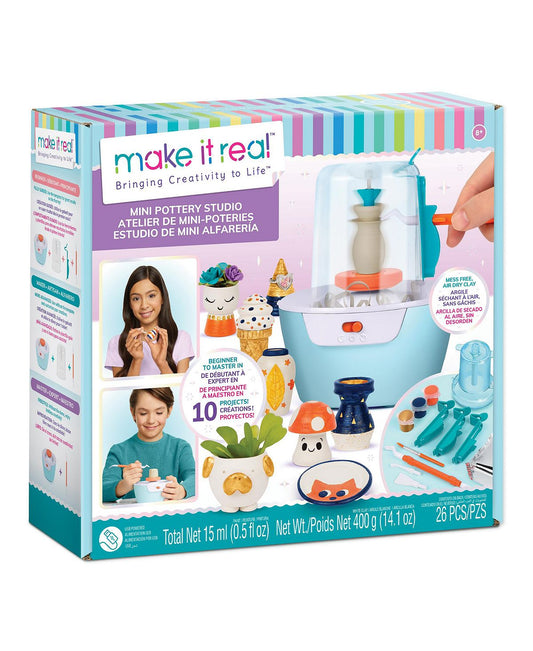 Make It Real Mini Pottery Studio set with turquoise pottery wheel, clay tools, paint colors, and finished ceramic pieces including planters and decorative bowls