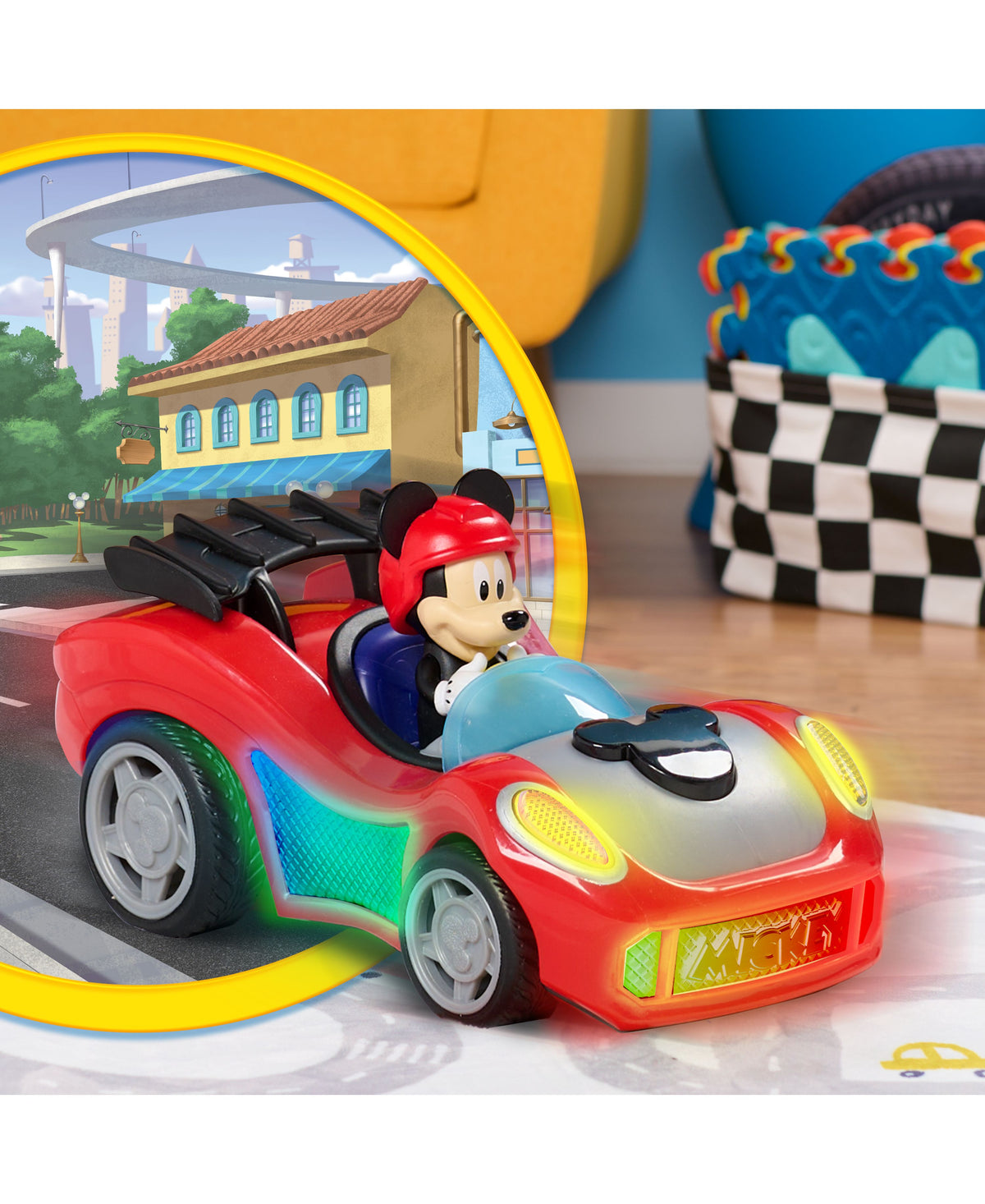 Mickey Mouse Rev 'N Go red race car with lights and sounds, featuring Mickey character in driver's seat
