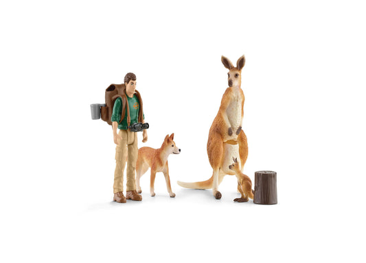 Schleich Wild Life Outback Adventures playset with ranger figure holding binoculars, dingo, adult kangaroo with joey, and log piece on plain background
