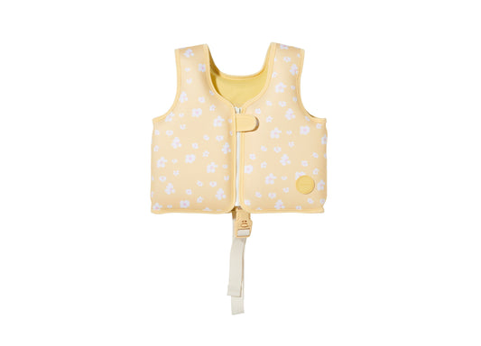 Sunnylife Kids Swim Vest for Ages 2-3 in yellow with white floral pattern, front zip closure and adjustable safety strap