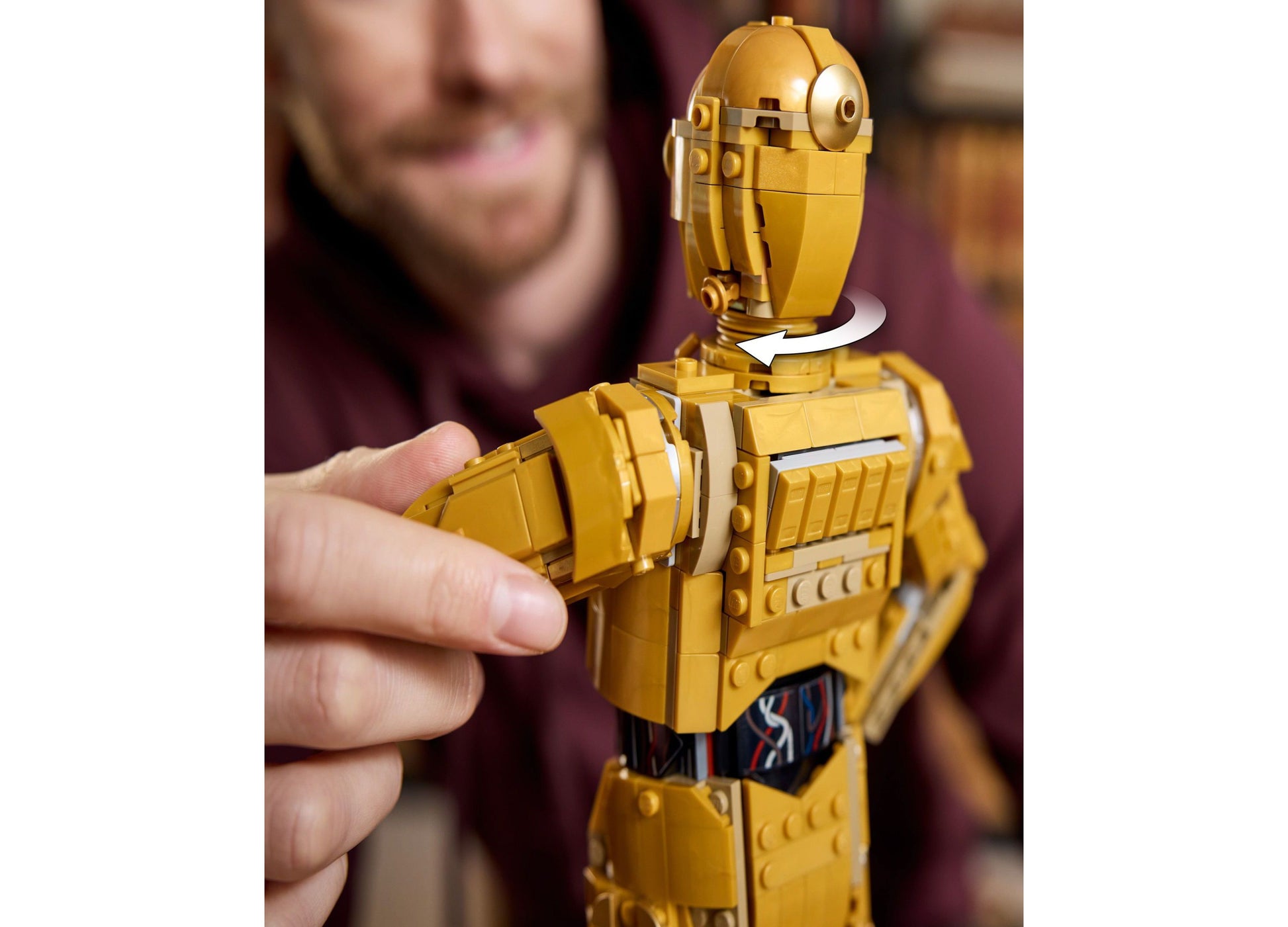 LEGO Star Wars C-3PO buildable droid figure in gold, held in hand, 1138 pieces