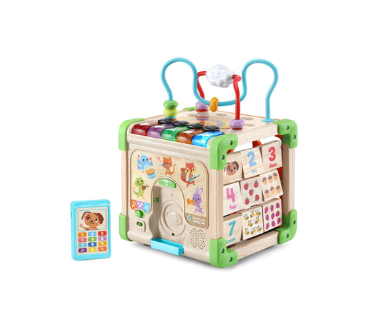 Wooden activity cube with colorful bead maze, number tiles, shape sorters, and blue curved handles on top; includes small blue phone toy
