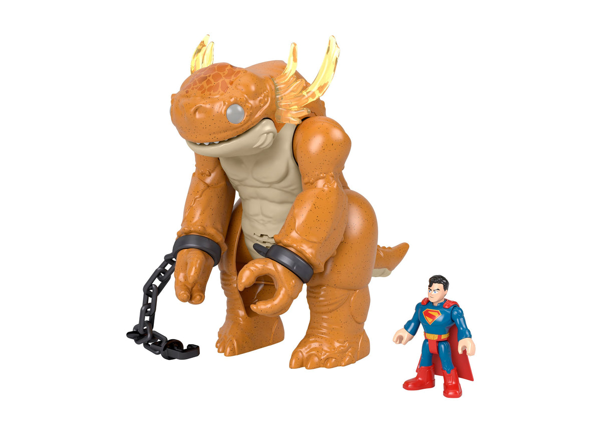 Imaginext Superman Kaiju Clash Toy set with 10" tall orange monster figure with golden horns, black chains, and small...
