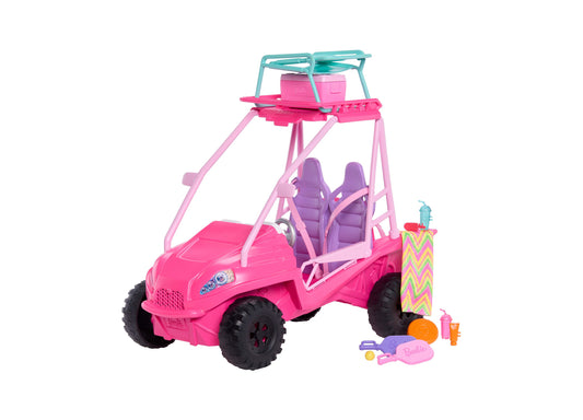 Bright pink Barbie beach buggy vehicle with turquoise roof, purple seats, black tires, and accessories including a colorful striped beach bag, food items, and p