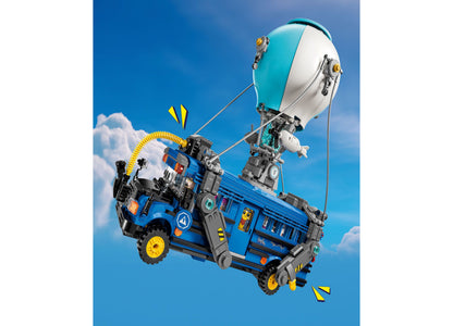LEGO Fortnite Battle Bus toy with blue truck, turquoise balloon, and yellow accents against sky background