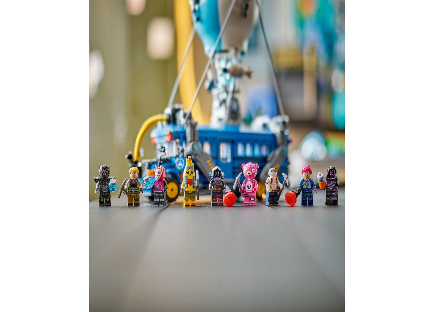 LEGO Fortnite Battle Bus toy set with colorful minifigures and blue bus vehicle