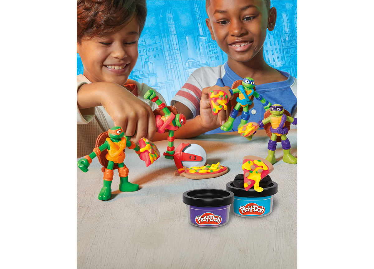Play-Doh TMNT Cowabunga Creations playset with four colorful Ninja Turtle action figures and Play-Doh cans