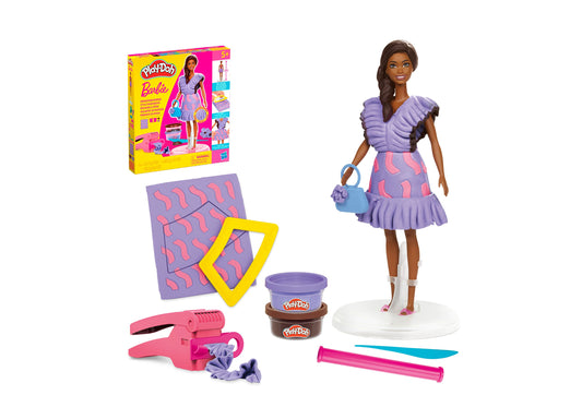 Play-Doh Barbie Fashionista Ruffles set with Barbie doll wearing purple ruffled dress, Play-Doh tools, mats, containers, and accessories on plain background