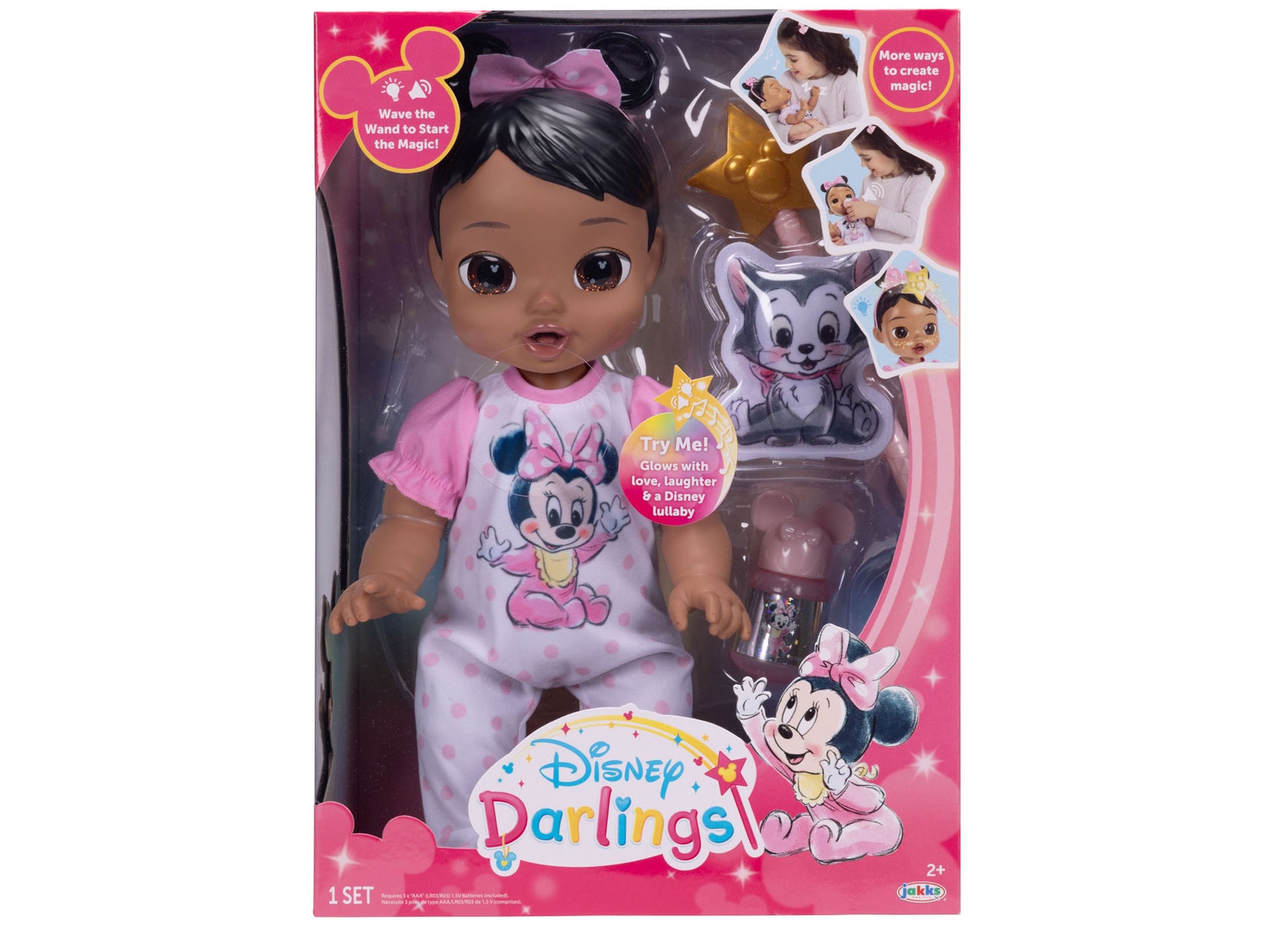 Disney Darlings 13-inch doll with black hair, pink bow, and Minnie Mouse graphic shirt, shown in packaging with accessories and wand