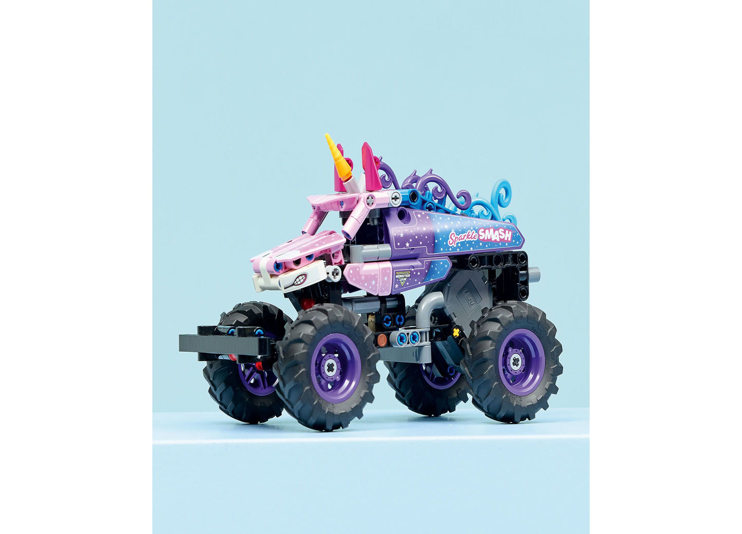 LEGO Technic Monster Jam Sparkle Smash pull-back truck with pink unicorn head, purple wheels, and star design