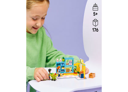 LEGO Friends Heartlake City Convenience Store 42680 building set with 176 pieces, featuring blue and yellow store wit...