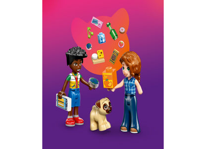 LEGO Friends Heartlake City Convenience Store set with two minifigures, puppy, and colorful accessories