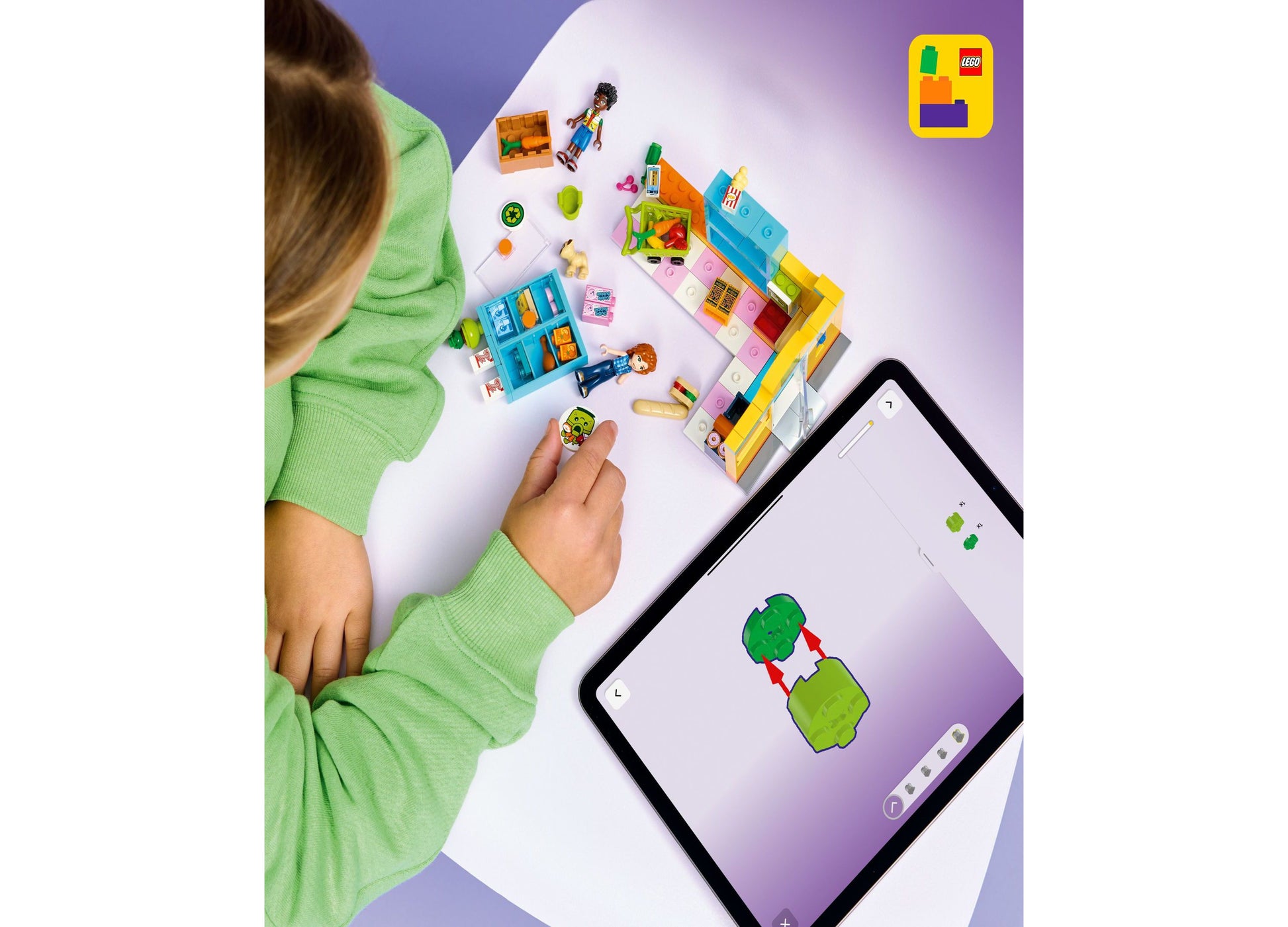LEGO Friends Heartlake City Convenience Store set with colorful building pieces, minifigures, and AR app on tablet