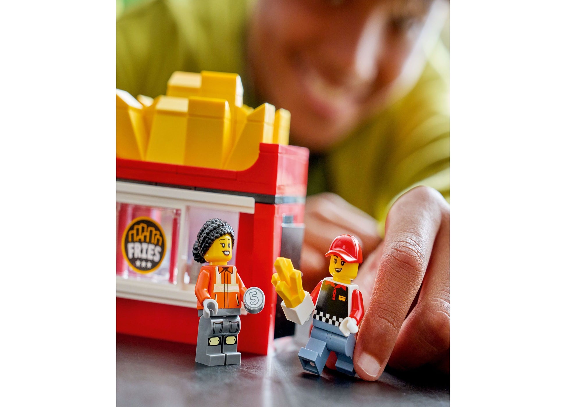LEGO City Fries Food Truck 60488 set with yellow fries, red truck, and minifigures