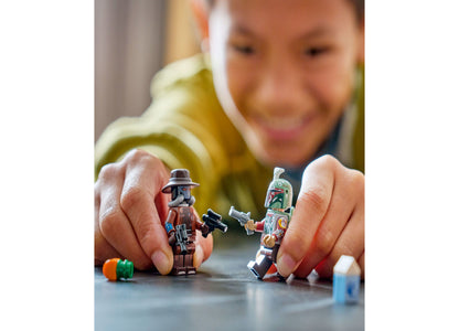 Child playing with LEGO Star Wars Cobb Vanth's Speeder building toy set with minifigures
