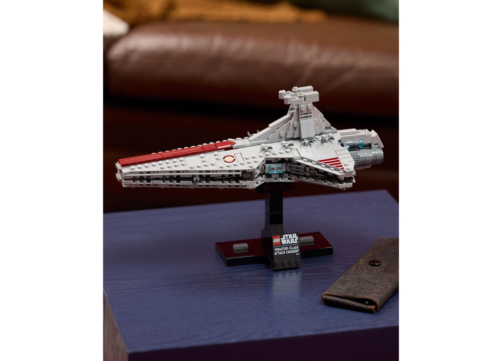 LEGO Star Wars Venator-Class Attack Cruiser 75441 white and red brick building set displayed on stand