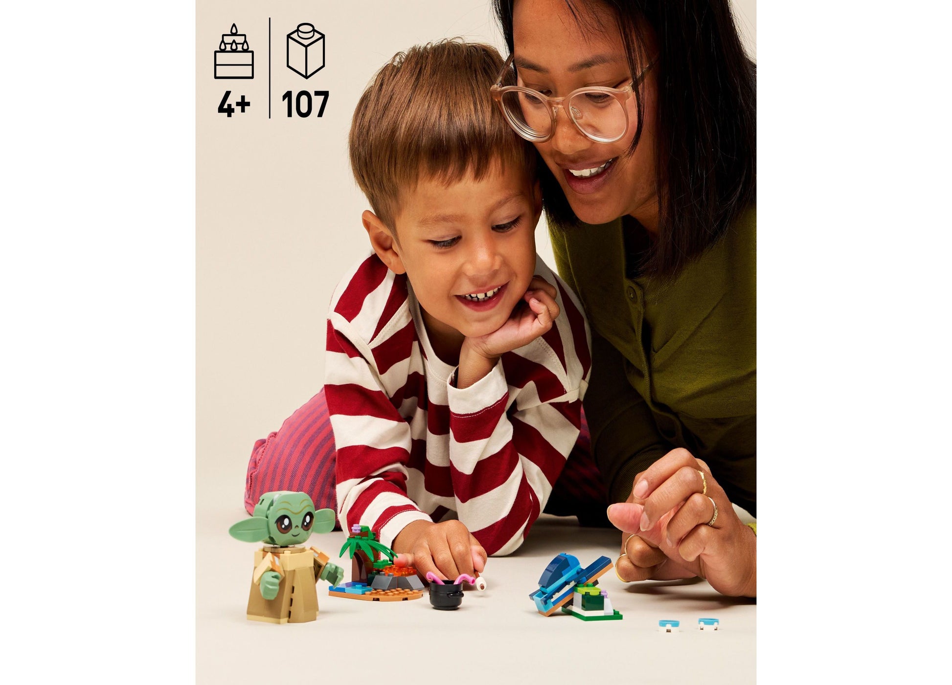 LEGO Star Wars Grogu's Homestead 75443 building set with 107 pieces, displayed with adult and child playing