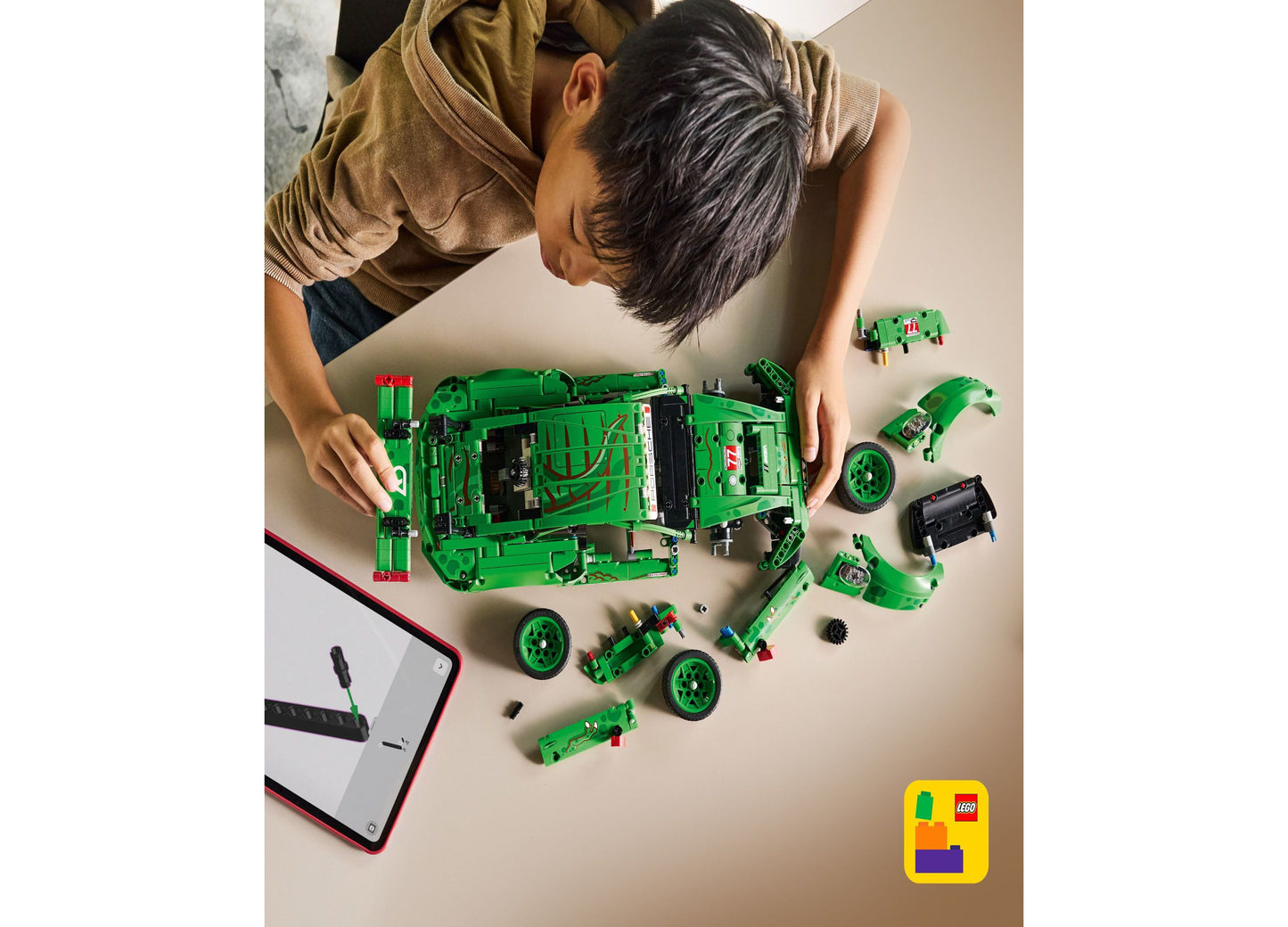 LEGO Technic Porsche 911 GT3 R green racing car set disassembled showing components
